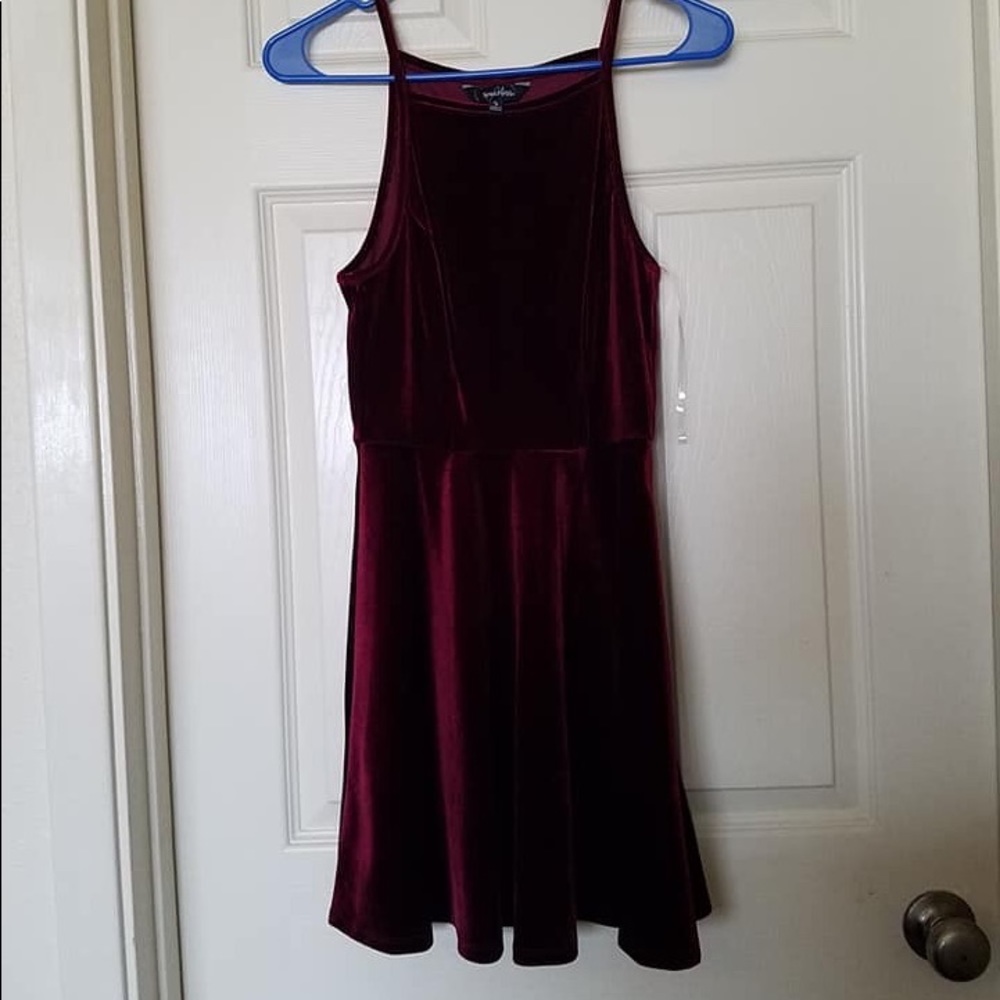 Burgundy velvet skater dress.